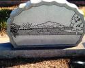 A sketched monument with a one of kind scene offers a more personalized option for a grave marker. 
